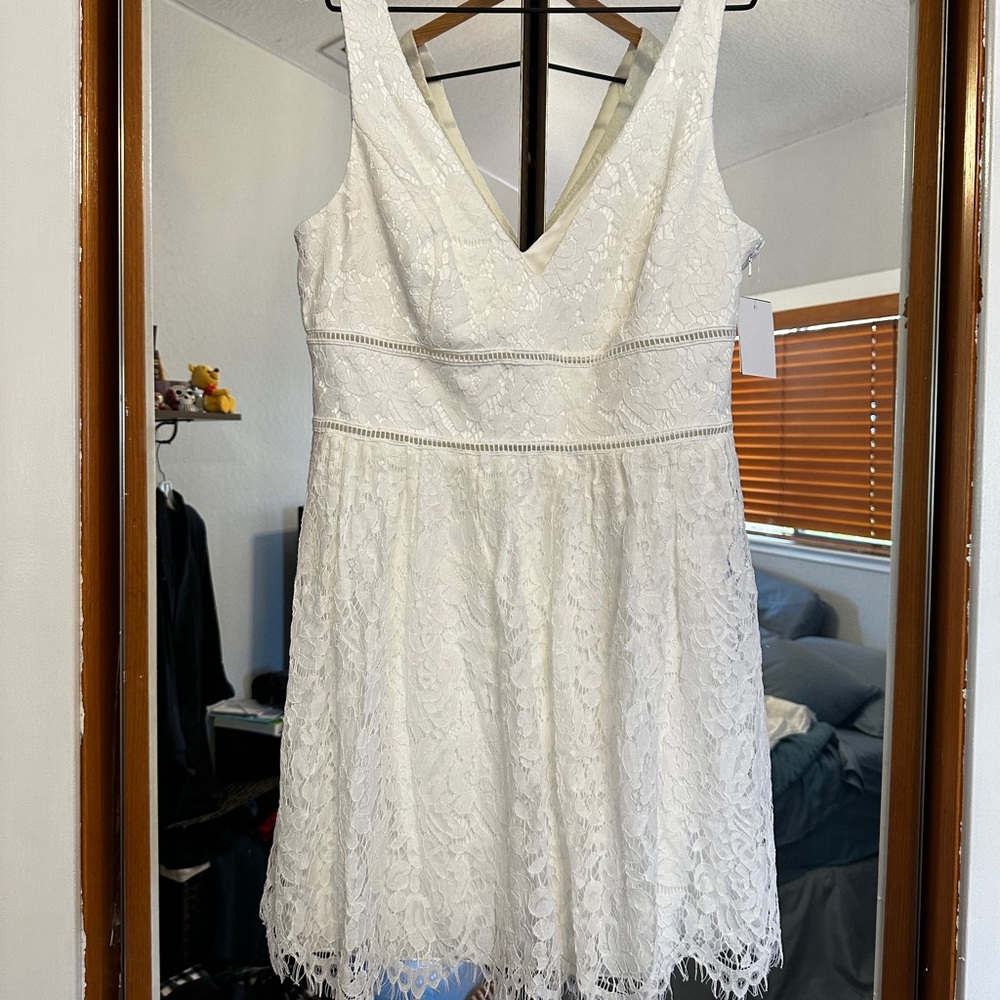 New with tags mini dress from David’s bridal